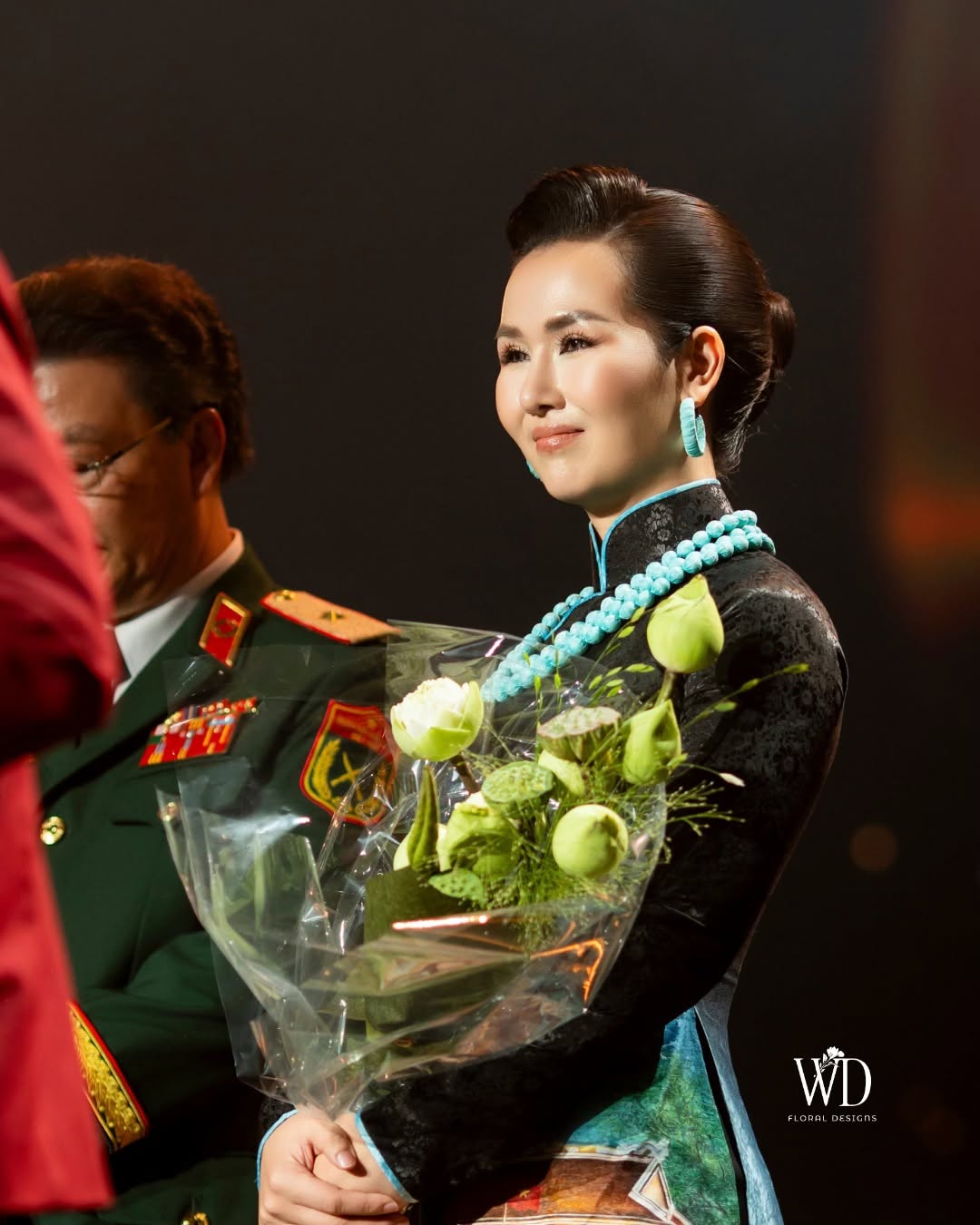 Premium bouquet presentation at a stage event